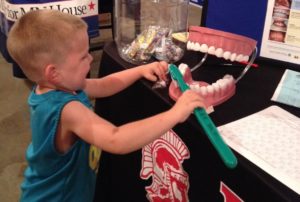 Teaching children and caregivers about the importance of dental care is crucial. 