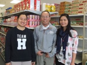 Happy Family in Asian Grocery store