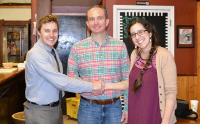 Bluenose Gopher Public House board members Andrew and Sarina shake hands with SWIF Vice President Scott Marquardt