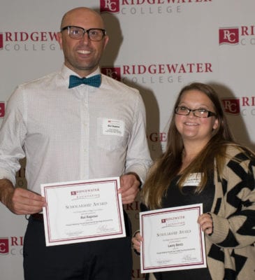 Rui and Lacey are pictured holding certificates for their nursing scholarship awards.