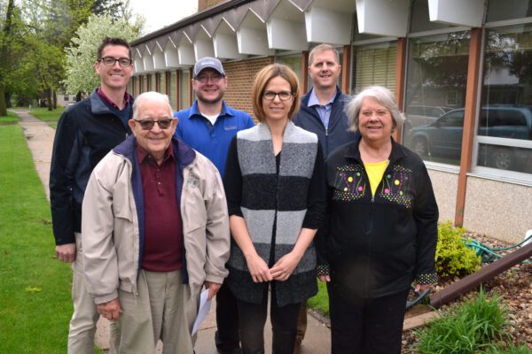 Dawson Community Foundation Advisory board members pose for a group photo outside