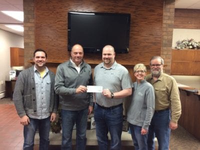 Pipestone Area Community Foundation board members accept a donation from First Bank & Trust to the fund to build a new concession stand and restrooms for the baseball fields at Westview Park. Pictured are Gavin Winter (from left), PACF board member; Kevin Paulsen, president of First Bank & Trust in Pipestone; and PACF board members Blake Klinsing, Linda Erickson and Ian Cunningham. Photo credit: Pipestone County Star