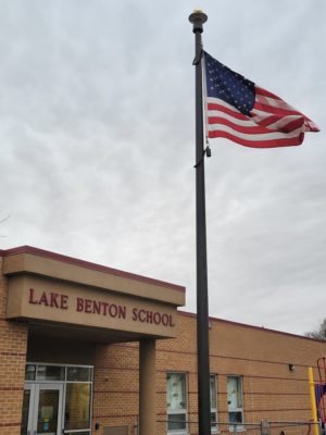 The U.S. flag waves in the wind outside Lake Benton Elementary