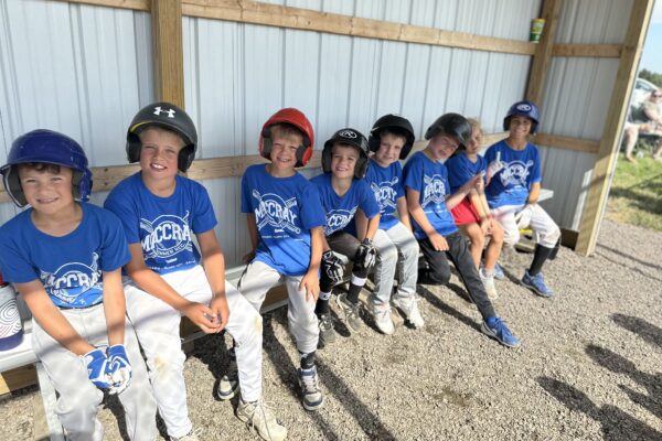 Kids enjoy summer rec baseball wearing blue T-shirts purchased with help from the MACCRAY 2180 Foundation.