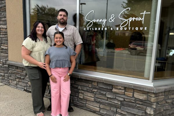 Shay VonHoltum with daughter Sophia VonHoltum and partner Alex LeBrun in front of their new store, Sunny & Sprout in Worthington.