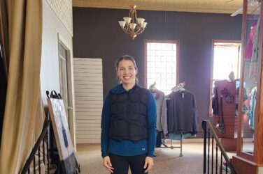 Autumn stands inside her New London consignment store, Closet Collective.