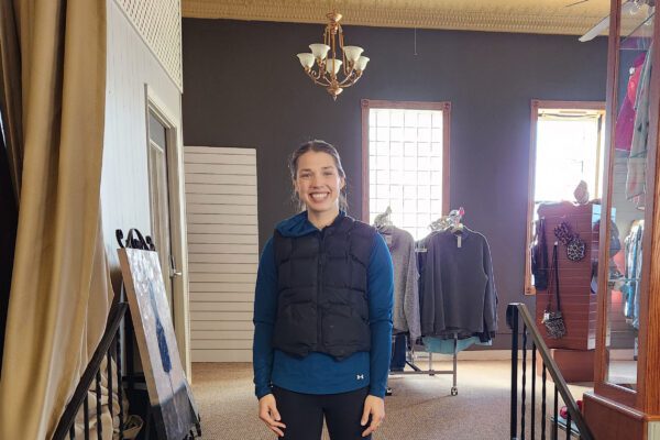 Autumn stands inside her New London consignment store, Closet Collective.