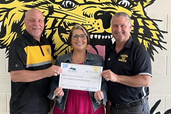 Lake Benton Elementary Principal Jeff Hansen, Lake Benton Area Foundation Board Chair Jess Gums and Lake Benton Schools Superintendent Loy Woelber.