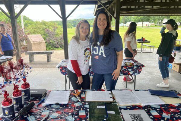 Brianna Goblirsch and Connie Bentson run check in for the Firecracker Run at Morton’s 4th of July Celebration.