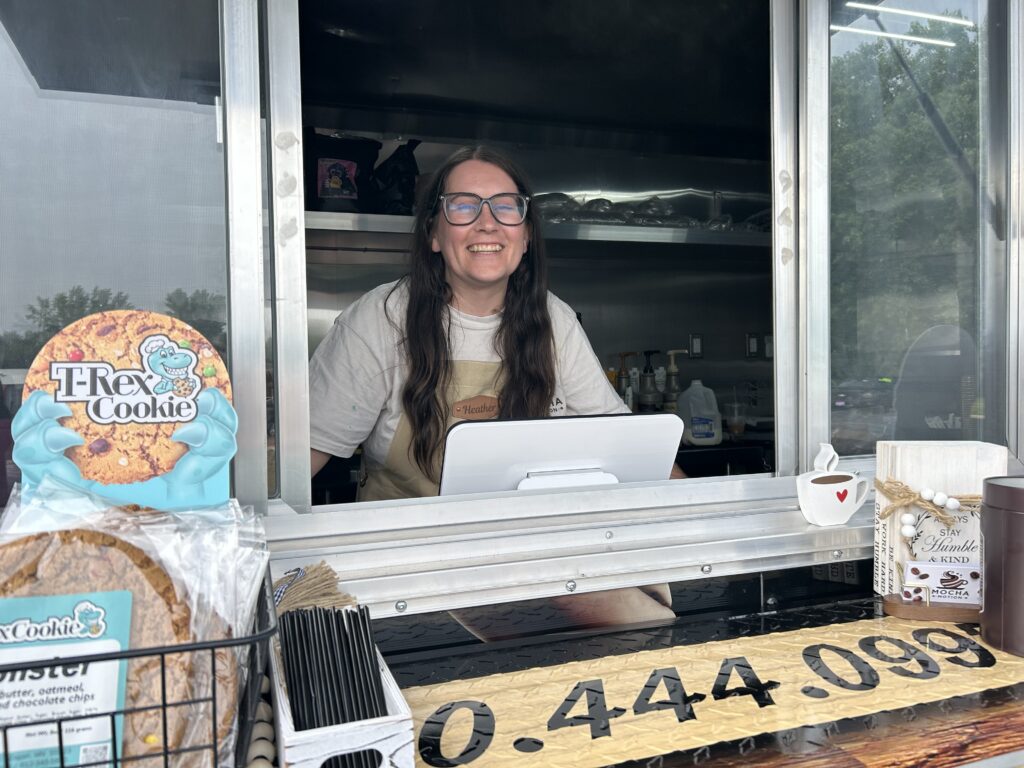 Heather stands inside her mobile coffee business, Mocha Motion