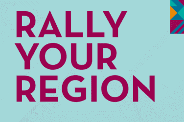 Large bold magenta text on a light blue background reads Rally Your Region Southwest Minnesota, with a colorful geometric pattern in the top right corner.