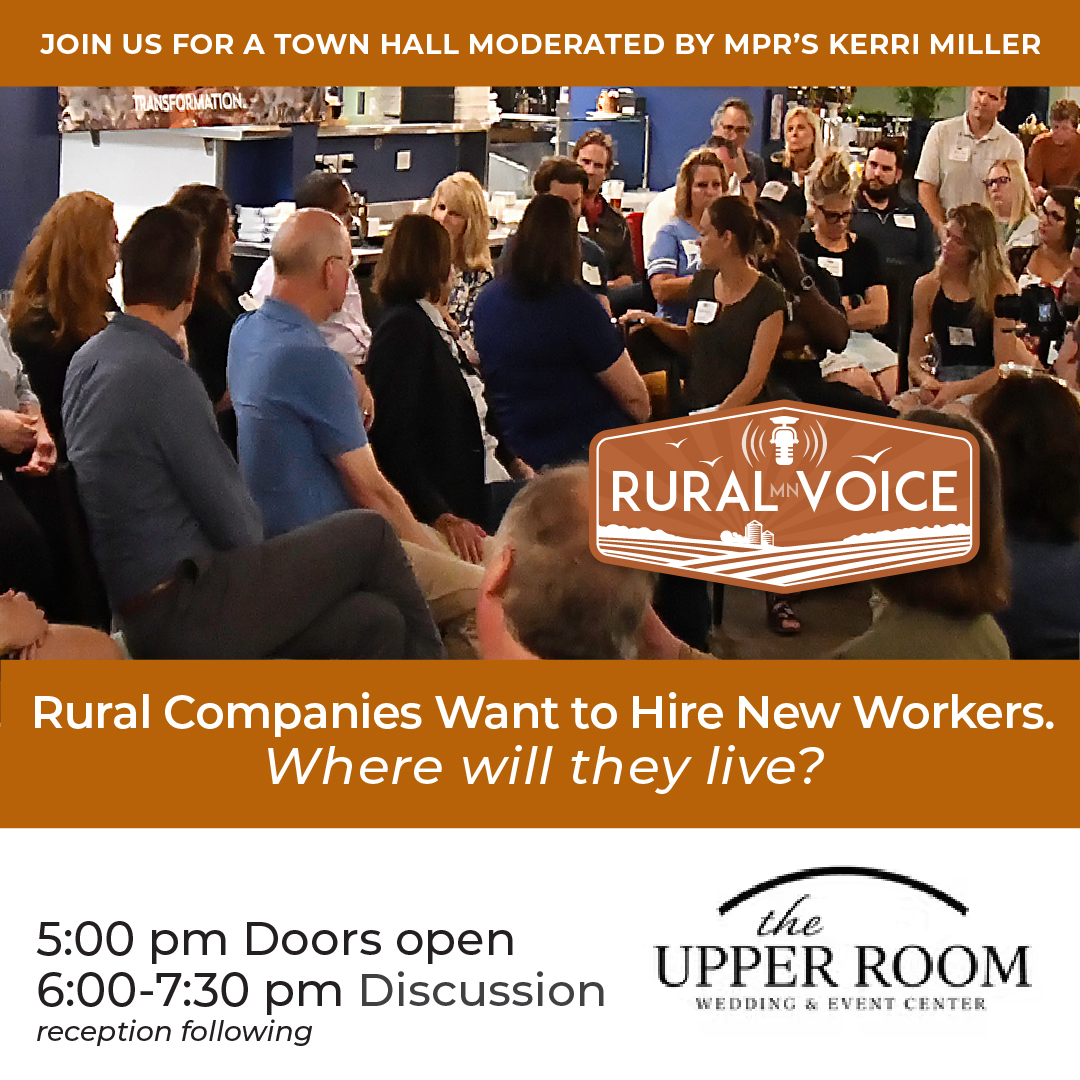 A group of people sit in a town hall meeting. Text overlay promotes a discussion on rural companies hiring new workers, held at The Upper Room event center, with doors opening at 5:00 pm and discussion from 6:00–7:30 pm.